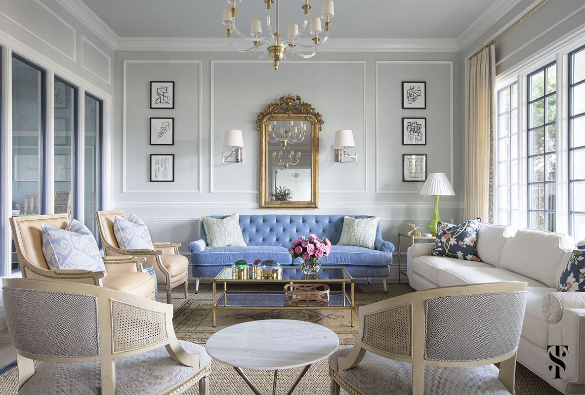 Chic Dental Office Lounge, Blue Sofa In Front Of French Gilt Mirror, Drapery Panels With Greek Trim, Interior Design by Summer Thornton Design
