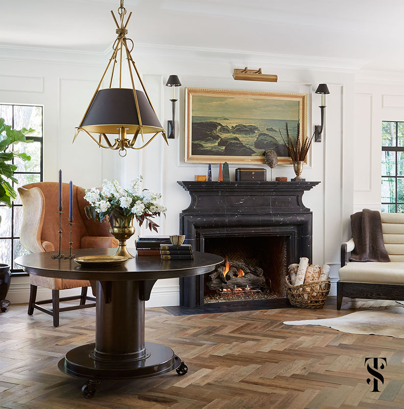 Country Club Tudor, Living Room With Black Marble Fireplace And Wood Herringbone Floor, Interior Design by Summer Thornton Design