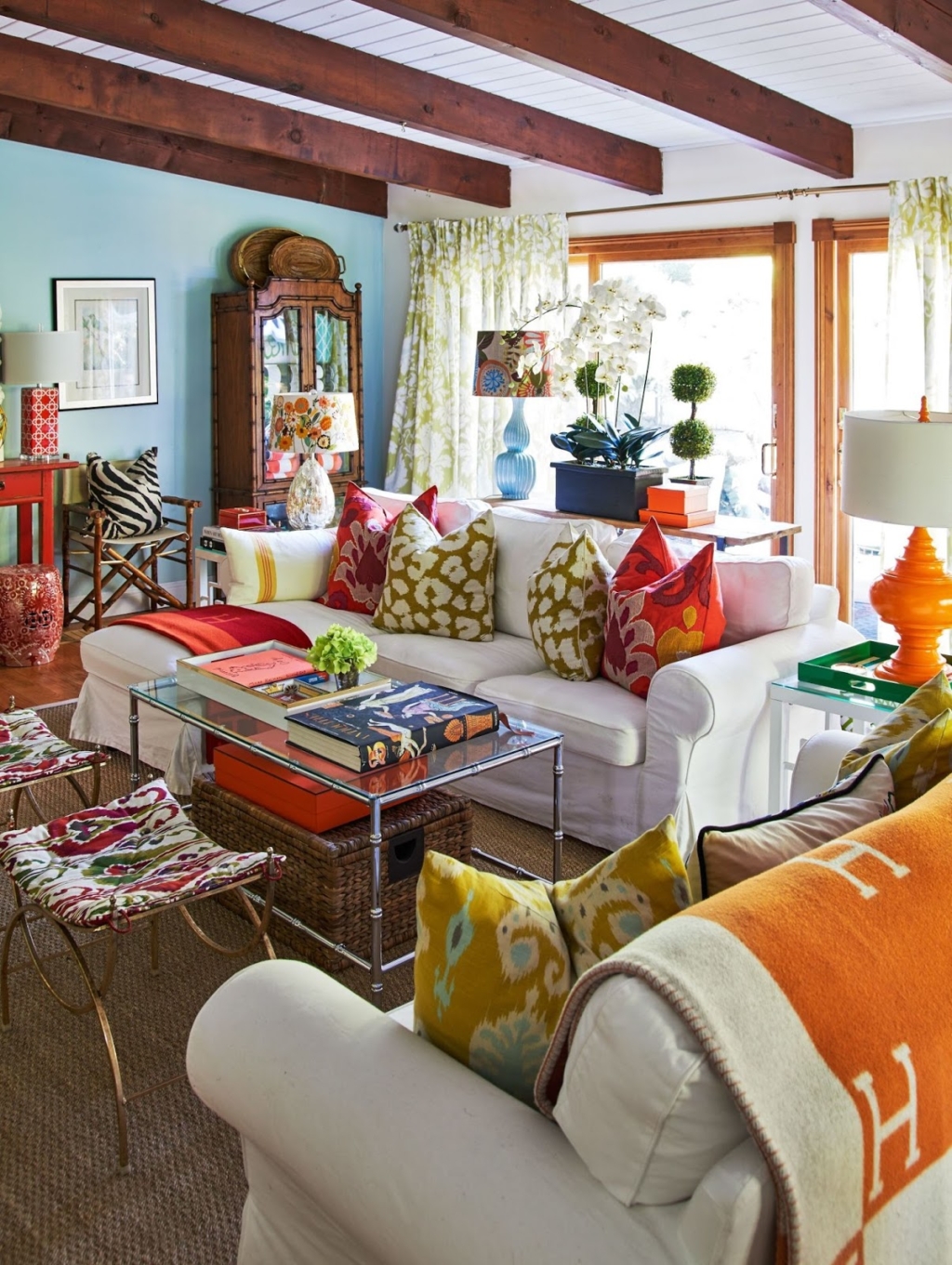 colorful living room with faux bamboo coffee table