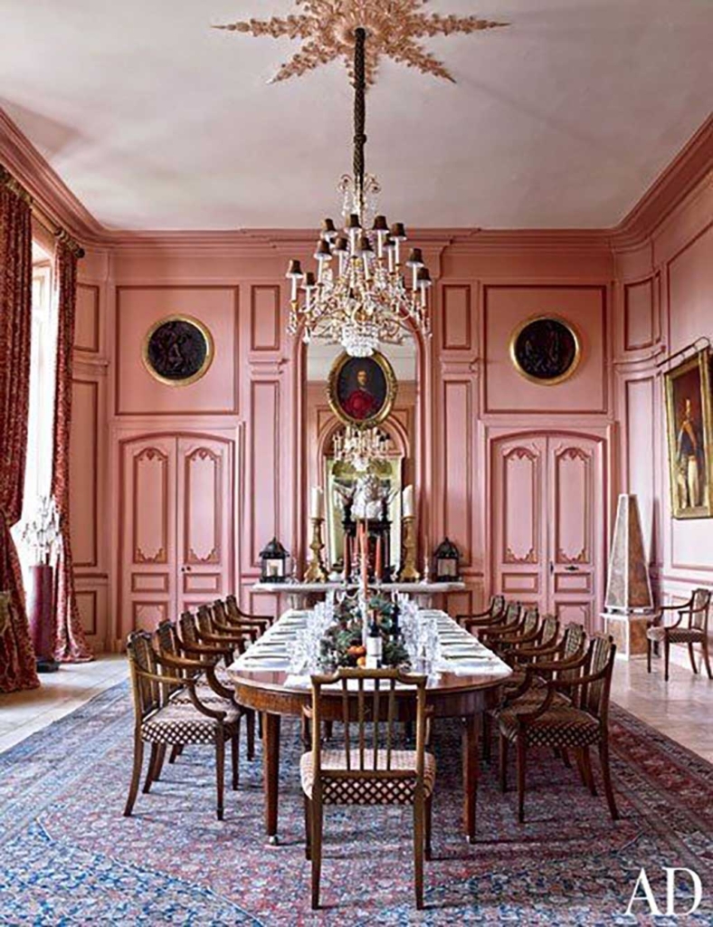 Timothy Corrigan pink and brass dining room via Architectural Digest