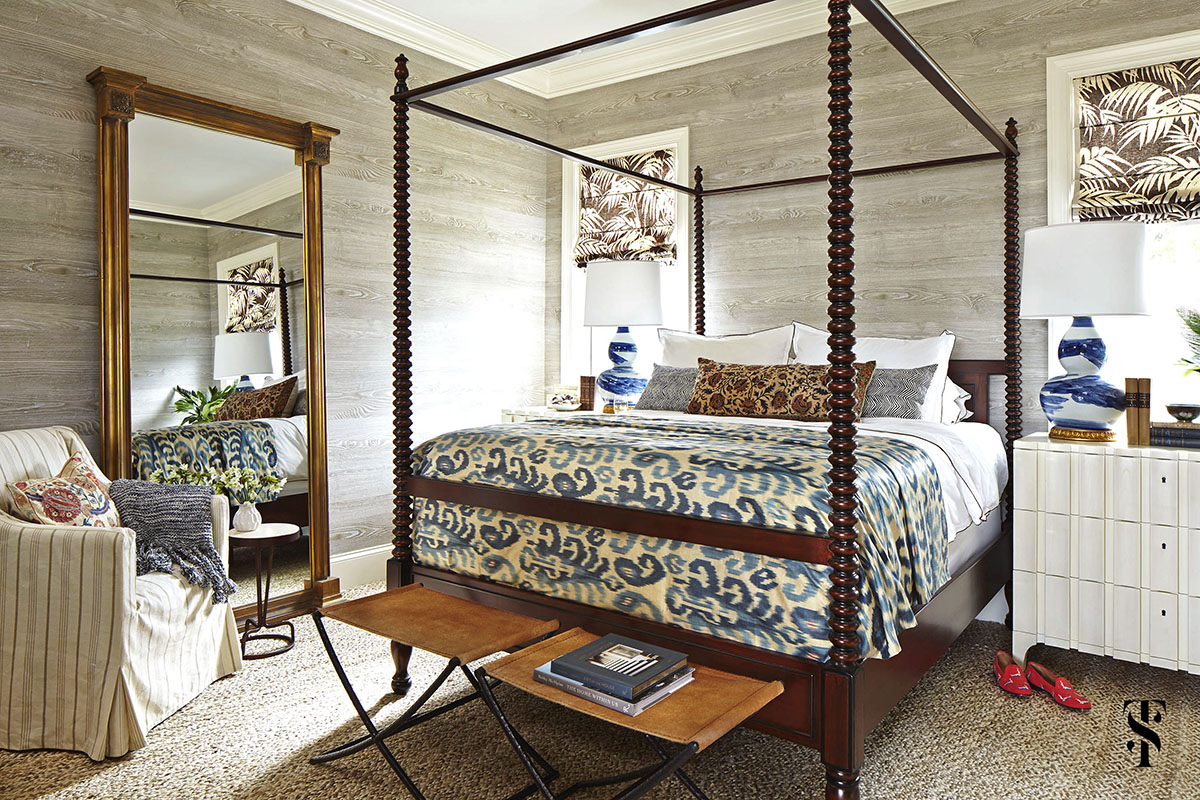 Naples Florida Interior Designer Summer Thornton - bedroom with faux bois wood walls by noblis and ikat throw with a four poster bed - www.summerthorntondesign.com