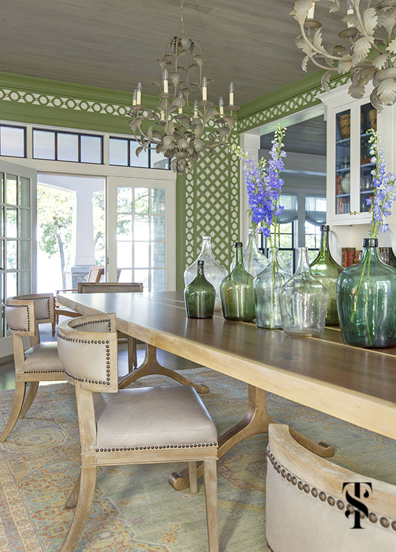 wisconsin lake house dining room in green trellis with live edge dining table, interior design by summer thornton www.summerthorntondesign.com