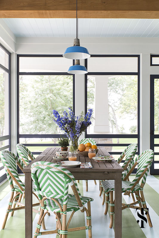 lake house porch with green striped floor and green bistro chairs by serena & lily, interior design by summer thornton www.summerthorntondesign.com