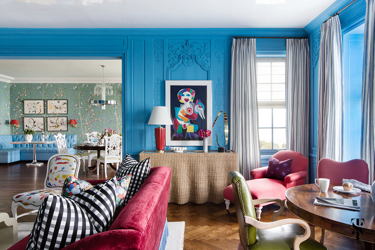 Chicago Co-Op at 1500 Lake Shore Drive interior design by Summer Thornton. Living room features farrow and ball St Giles blue, burgundy red silk velvet sofas, joan miro artwork, & more.