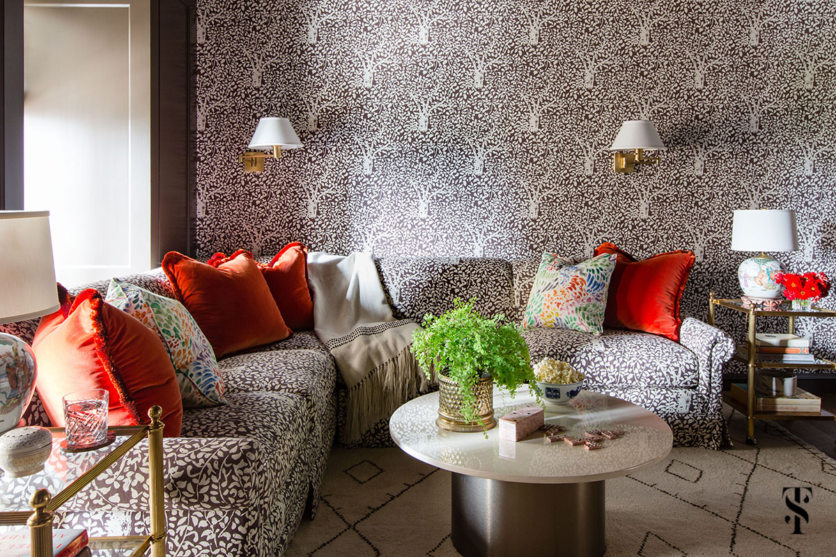 Interior design by Summer Thornton of a Chicago Co-Op at 1500 Lake Shore Drive. Family room features matisse tree pattern in matching wallpaper and upholstery.