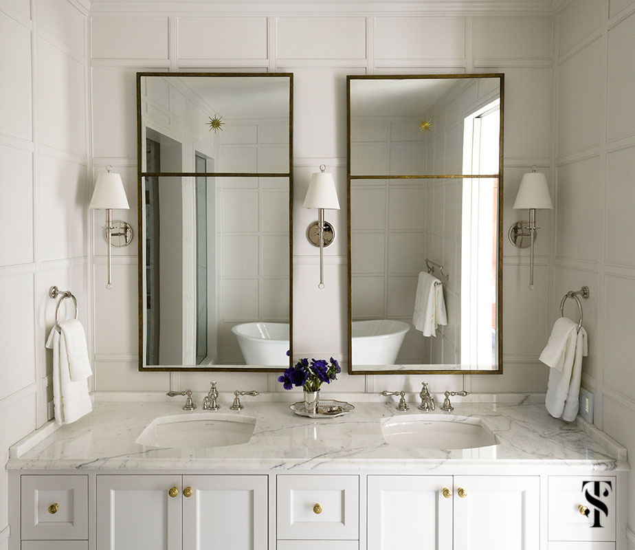 classic dream bathroom designed by Summer Thornton with white paneling, soaking tub, and waterworks faucetry - visit www.SummerThorntonDesign.com for more photos.