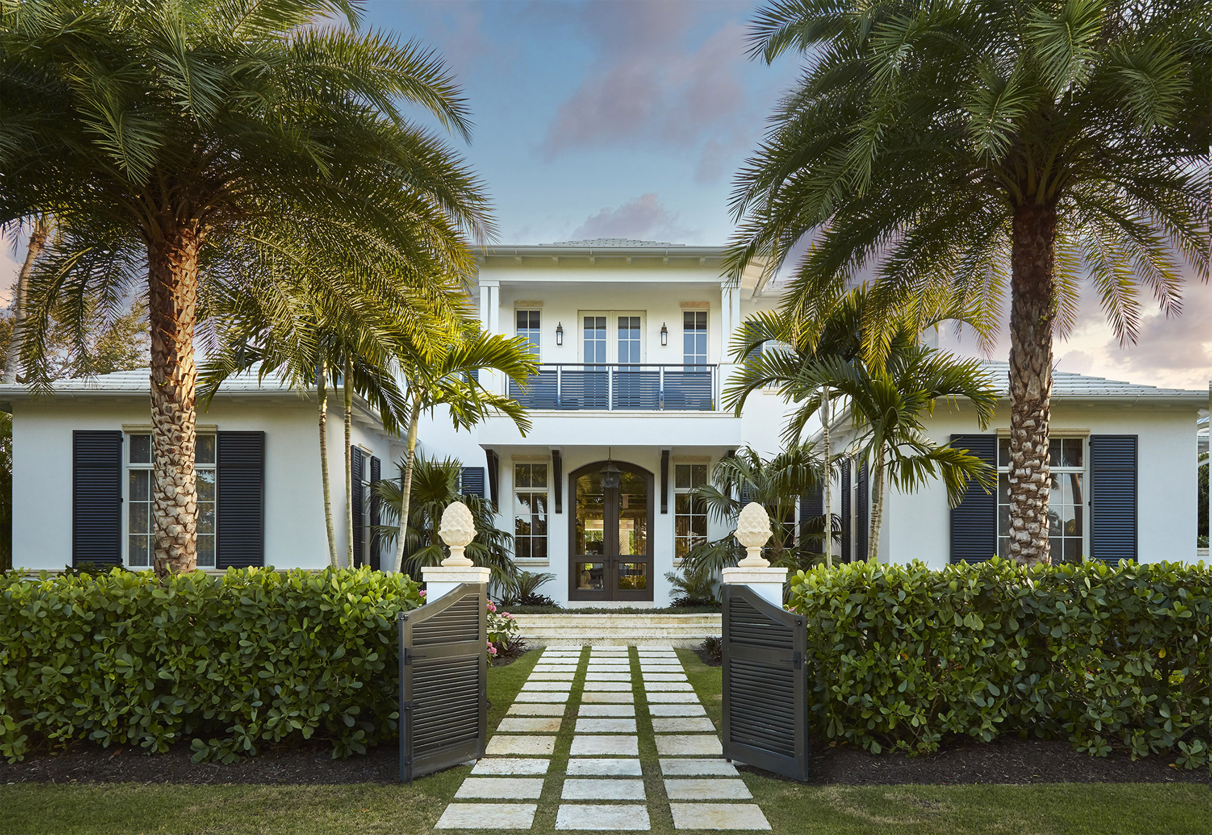 Exterior of a home located in Old Naples, FL, interior design by Summer Thornton, exterior by Kukk Architecture