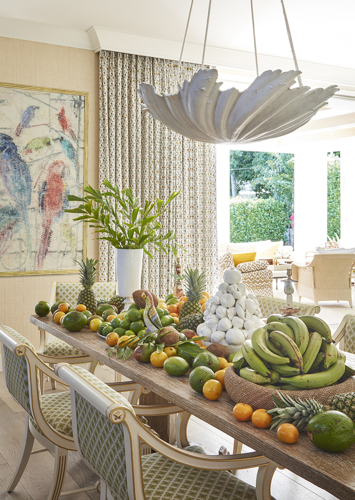 Summer Thornton creates a magical fantasy dining room in this tropical home located in Old Naples, FL
