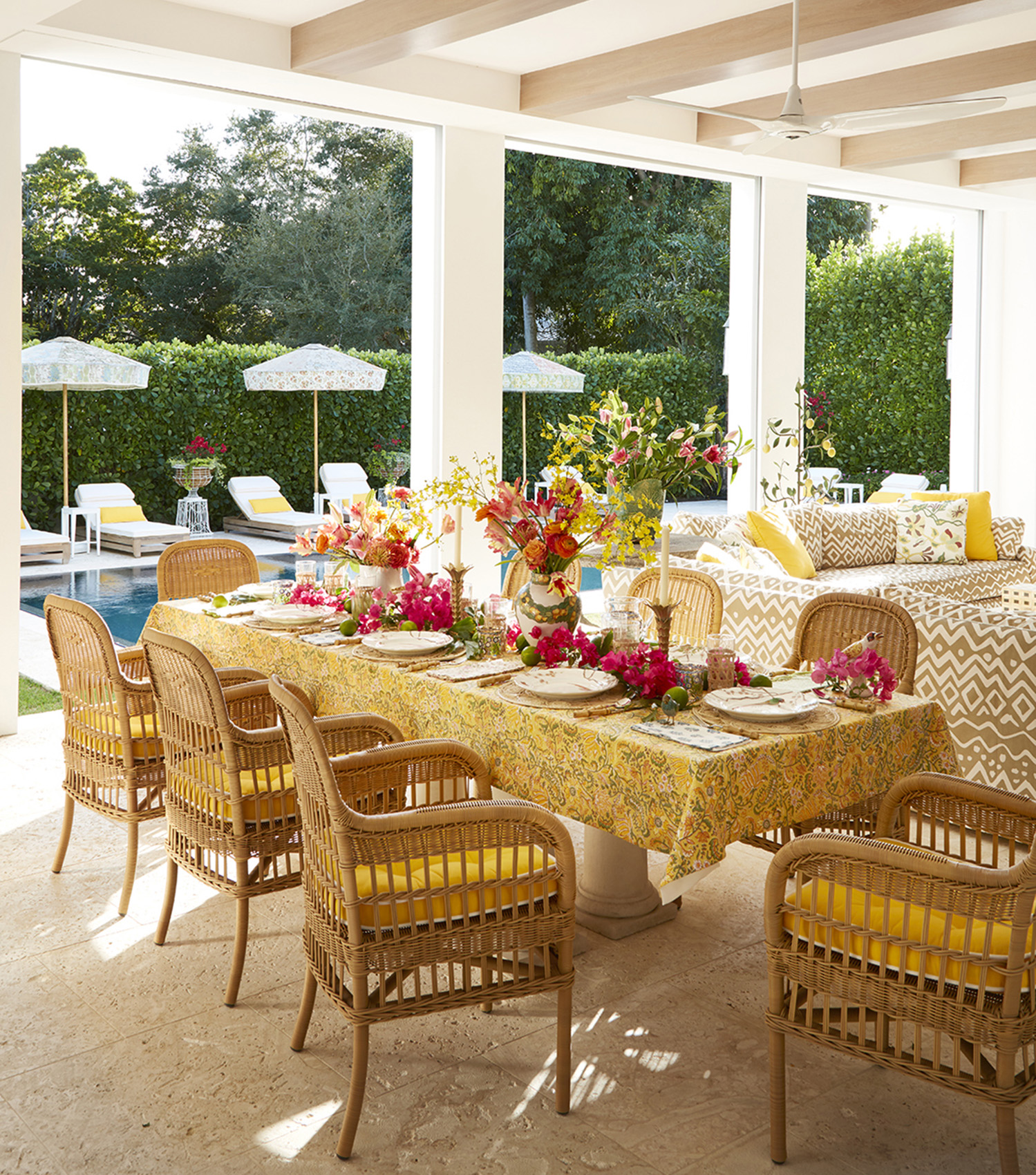 Lanai designed by Summer Thornton in this tropical house located in Old Naples, FL.