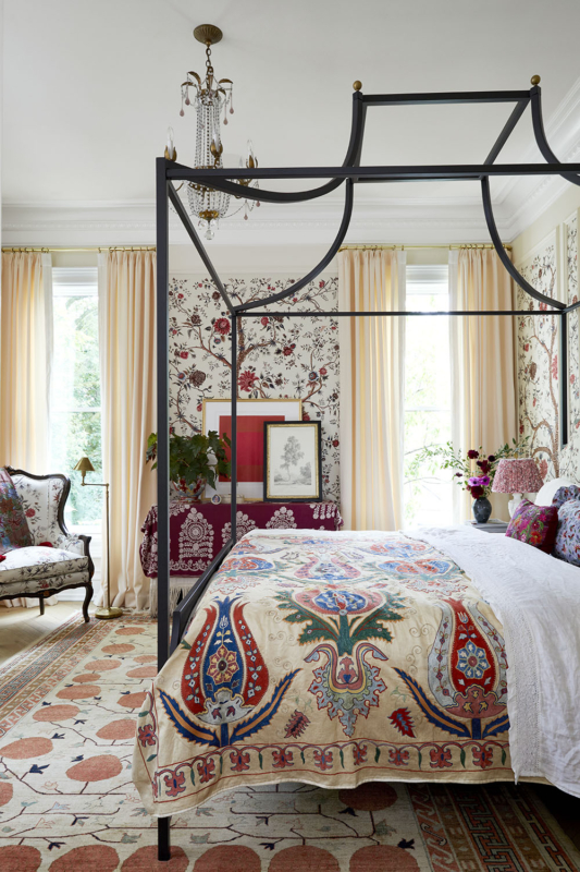 Summer Thornton’s personal Chicago residence designed by Summer Thornton. Master Bedroom features a layering of feminine patterns from around the world.