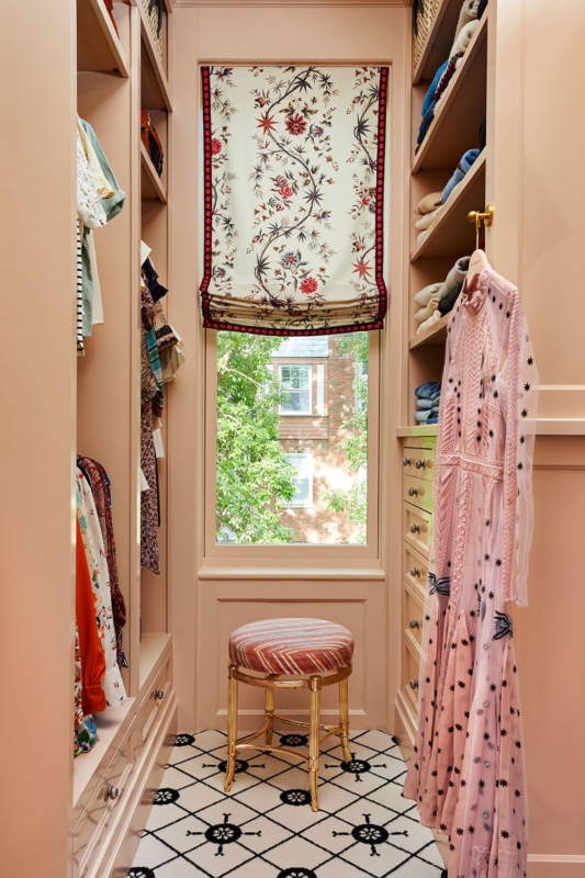 Summer Thornton’s personal Chicago residence designed by Summer Thornton. Master Closet features high gloss rosy pink milllwork, graphic carpeting and floral window treatment.